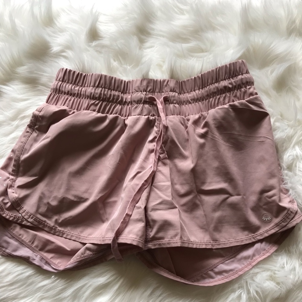 Pink running shorts